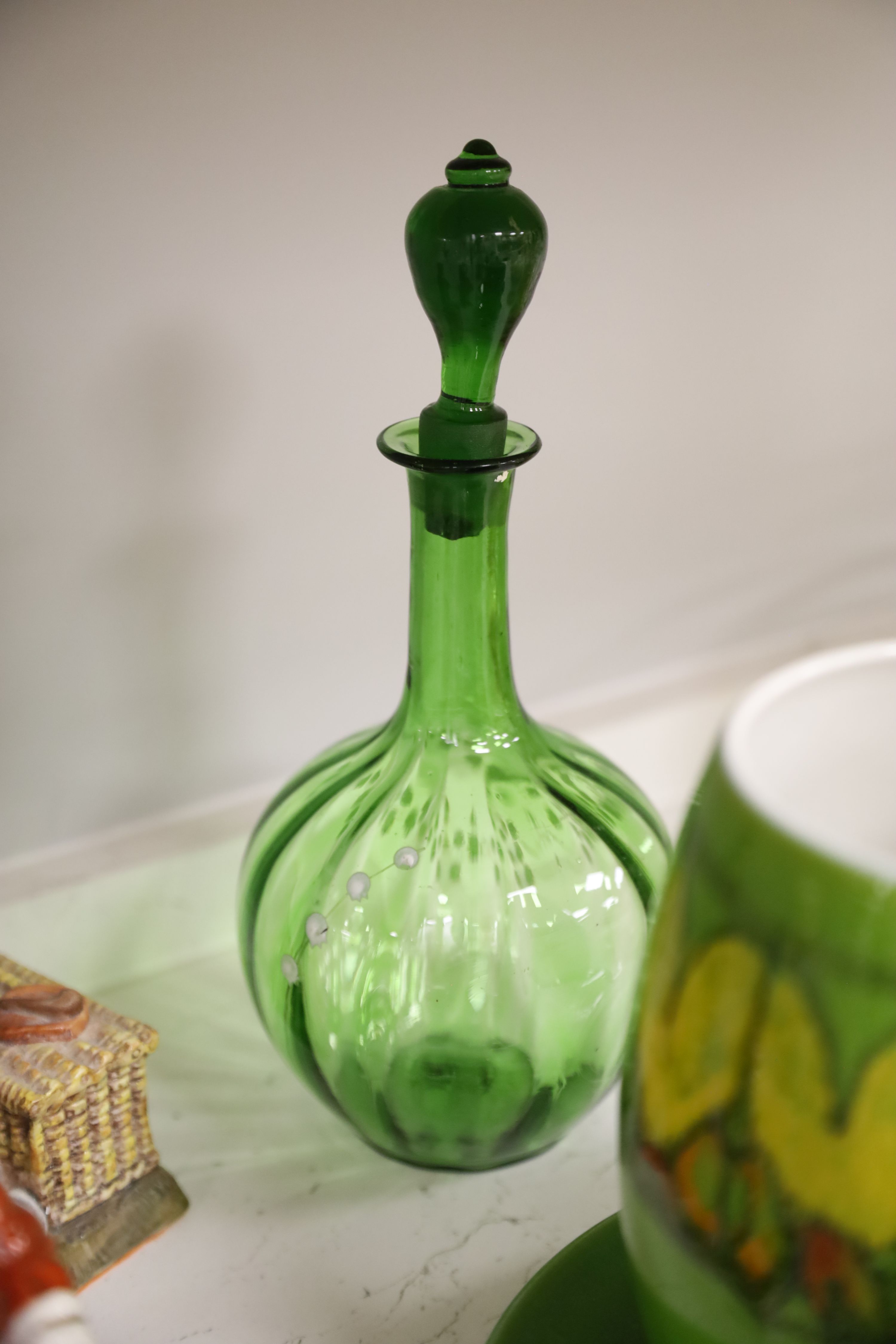 A quantity of mixed ceramics including Poole, Staffordshire, Goebel and a green glass decanter